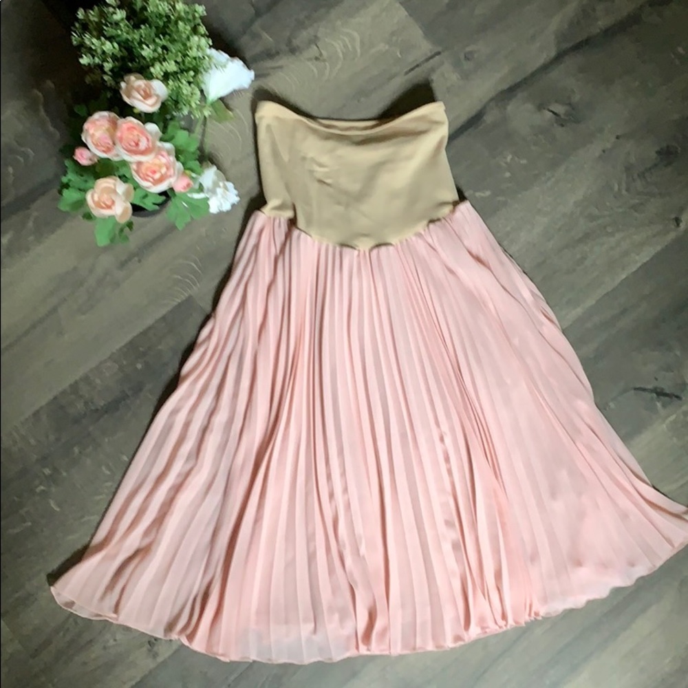 Pleated pink maternity midi skirt